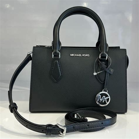 michael kors tasche kopie|Michael Kors opened satchel purse.